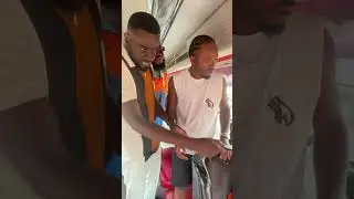 Code Micky in a serious confrontation with a driver in a bus loading from Accra - Kumasi