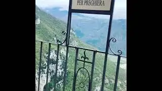 Church built into a cliff called Sanctuary of Modonna Della Corona