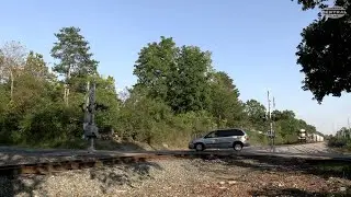 Norfolk Southern Local and Amtrak at Broken Railroad Crossing