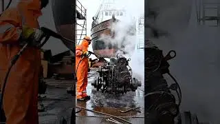 A heavily rusted iron trawler pulled into a dry dock.  #asmr