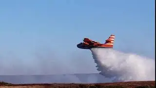 Water Bomber Douses Fire in Portugal Cove South