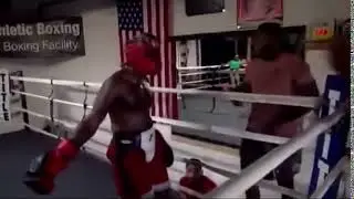 Viddal Riley (KSI Boxing Training Coach) slaps KSI (Olajide Olatunji) on the head whilst training