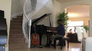 Kris Nicholson test drives a Samick SIG-50 baby grand piano after tuning it