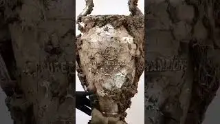 Cleaning barcelonas last champions league trophy