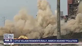 One year after demolition coats neighborhood with dust, residents rally