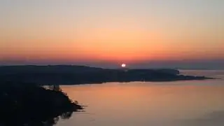 Solopgang en tidlig morgen ved Horsens Fjord