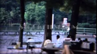 1961: Beach vacation spot picnic tables relaxing recreation area. TOKYO, JAPAN