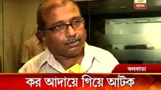 KMC people detained in a lift by the staffs of a company as they went to serve warrant.