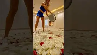 Imagine waking up in this white rose bedroom