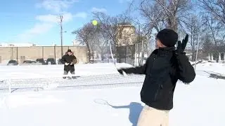 Winnipeg winter tennis match on World Tennis Day