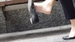 Candid black flats dangling shoeplay outside part 1