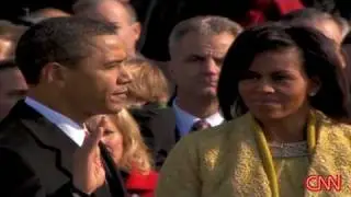 Obama takes historic oath
