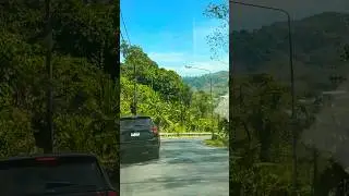 TROPICAL ROAD ON THE HILL