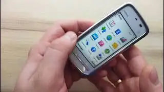 5230 сенсорный смартфон от Nokia 2009 года