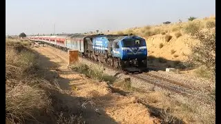 Glorious 06587 YPR BKN WDP-4 blue with white loco amidst sand dunes Waiting a long Goods trains