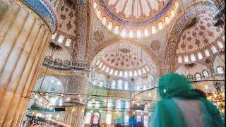 Zoom out Timelapse of The Blue Mosque interior or Sultanahmet indoors in Istanbul city in Turkey