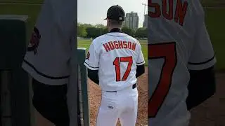 Callum Hughson pitches to bagpipes