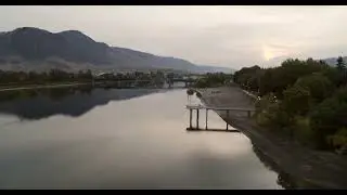 Aerial shot of Thompson River, Riverside Park and downtown Kamloops.