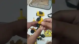 Menyusun Lego Kontruksi menjadi Robot