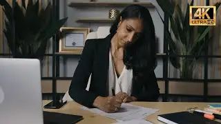 Legal Expertise: Female Lawyer Reviewing and Editing Documents | Professional Corrections | 4K Stock