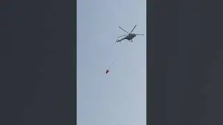 Indian Airforce - Helicopter in the process of firefighting, filling up water training