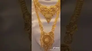 gold necklace and Rani haar design.