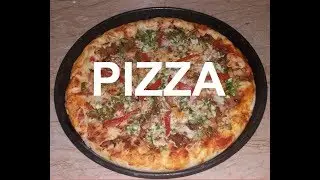 Pizza - A Quick Recipe by Ammaras Kitchen