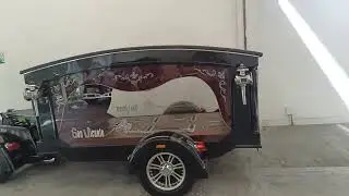 Medellin, Colombia beautiful funeral cars with Harley and Rolls Royce