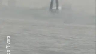 Paddle Boarder on the Hudson River
