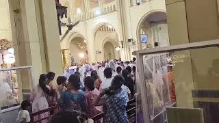 Many kids taking confirmation.