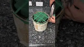 Taping down wet foam with waterproof floral tape for extra security