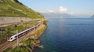 Electric Train For Transportation In Switzerland Countryside | Royalty Free 4K Stock Video Footage