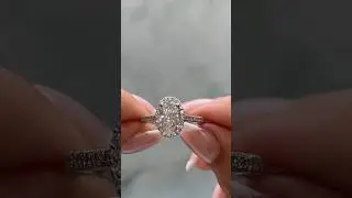 Just wow. A heavy carat oval halo pav&eacute; never goes wrong. #diamond #engagementring