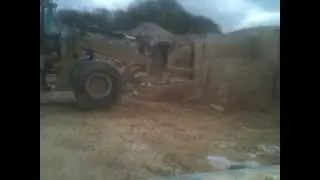 Doulting stone quarry.           Caterpillar 930h breaking out stone. www.doultingstonequarry.co.uk