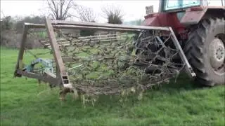 chain harrowing the fields