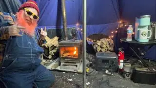 Hot tent, camping, beautiful fire on a snowy Michigan day