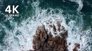 Spectacular Waves. Top-Down 4K Drone Shots of Ocean Crashing on Rocks.