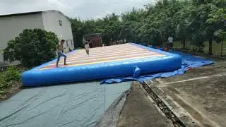 Most Popular Inflatable Jumping Pad for Kids And Adults-Rainbow inflatables ltd