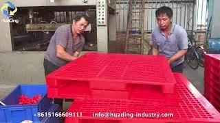 Factory production of heavy duty industrial plastic pallets