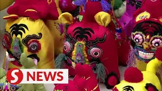 Chinese welcome Spring Festival with traditional activities