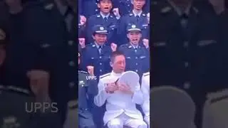 Korean female soldier is dropping the hat of commander while greeting.