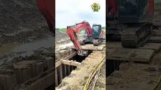 Mud Pit Excavator Operation: Heavy Equipment Digging Deep