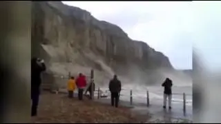 Raw: Dramatic Footage of Cliff Collapse in UK