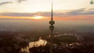 A Towering View Over Munich's Heart and the Alps Beyond