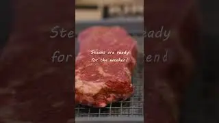Prime grade new york strip steaks prepped for the fridge with lawrys