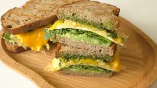 Pesto sandwiches with avocado and scrambled eggs