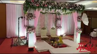 Blossoms Whisper Love, Petals Dance to the Eternal Vows - A Blessed Wedding Ceremony Setup