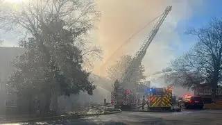 Fire rips through building at troubled South Fulton condo complex