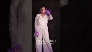 A stunning dual-shade white & purple jumpsuit with sequins | Nina Singh Design Studio Ph: 8920357565