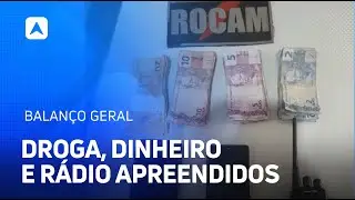 Dupla &eacute; flagrada com drogas, dinheiro e r&aacute;dios; um suspeito &eacute; preso